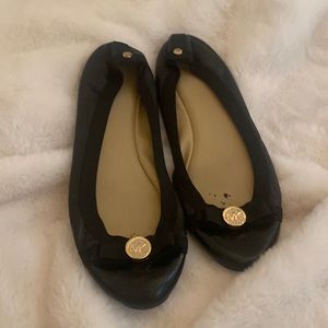 Black MK Flats with bow detail
